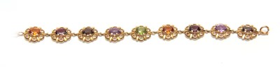 Lot 710 - A 9CT GOLD FILIGREE MULTI-COLOURED STONES...