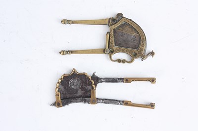 Lot 185 - TWO EASTERN 17TH/18TH CENTURY BRASS AND STEEL...