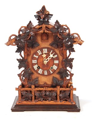 Lot 875 - A LATE 19th CENTURY BLACK FOREST CUCKOO CLOCK...