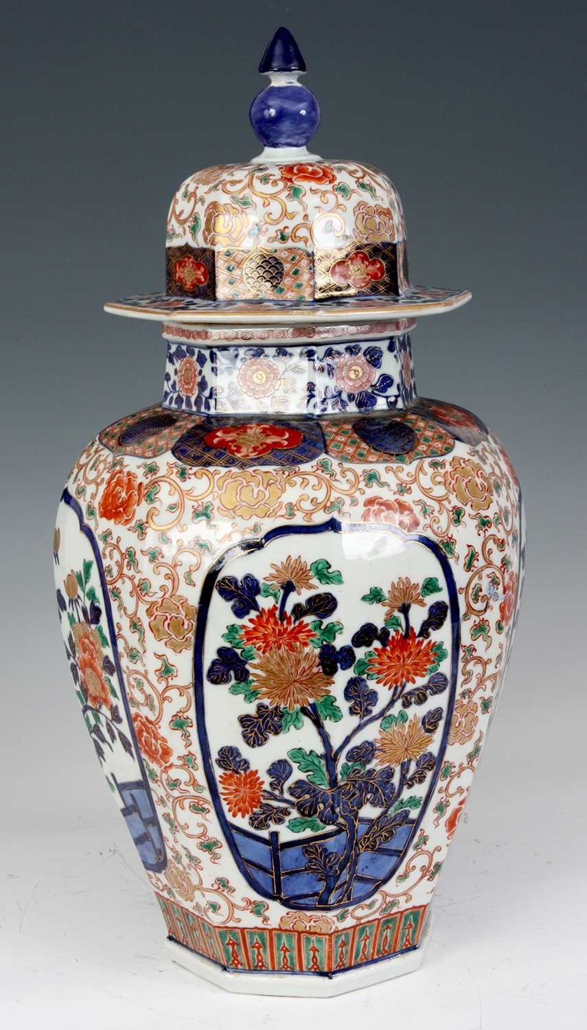 Lot 105 - A 19TH CENTURY IMARI HALL VASE AND COVER OF...