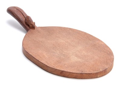 Lot 933 - A ROBERT MOUSEMAN THOMPSON OAK CHEESEBOARD of...