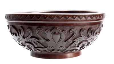 Lot 940 - AN EARLY 20TH CENTURY CARVED CIRCULAR BOWL...