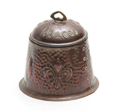 Lot 958 - AN ARTS AND CRAFTS HAMMERED COPPER TOBACCO JAR...