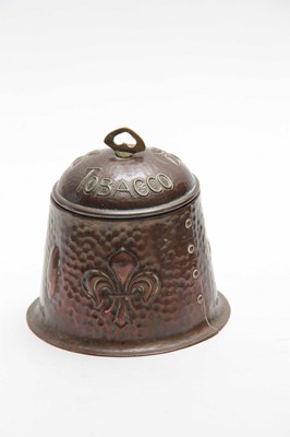 Lot 958 - AN ARTS AND CRAFTS HAMMERED COPPER TOBACCO JAR...