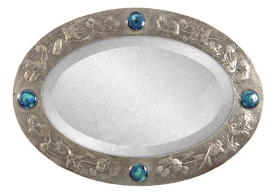 Lot 960 - A LATE 19th CENTURY LIBERTY PEWTER OVAL MIRROR...