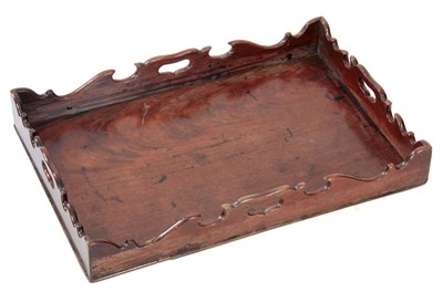 Lot 974 - A GEORGE III FIGURED MAHOGANY RECTANGULAR TRAY...