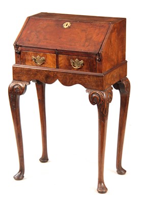 Lot 982 - A GEORGE I STYLE WALNUT BUREAU ON STAND with...