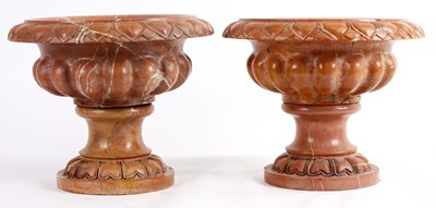 Lot 656 - A PAIR OF LATE 19TH CENTURY PINK MARBLE URNS...