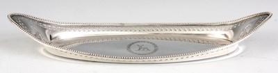 Lot 275 - A GEORGE III SLENDER OVAL SILVER CANDLE...