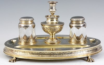 Lot 299 - A VICTORIAN SILVER GILT INKSTAND the oval...