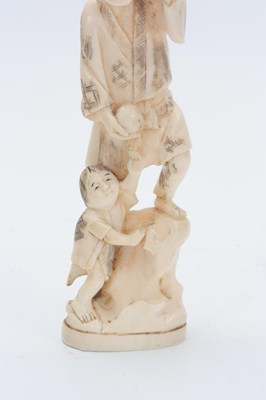 Lot 201 - A JAPANESE MEIJI PERIOD IVORY OKIMONO modelled...