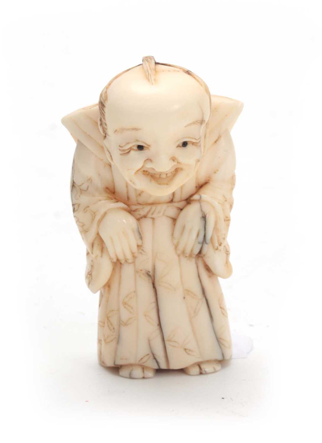 Lot 203 - A JAPANESE MEIJI PERIOD IVORY NETSUKE WITH...