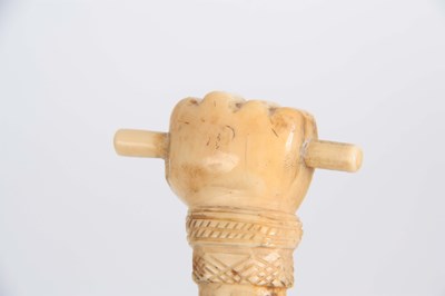 Lot 460 - A 19th CENTURY SCRIMSHAW WHALE BONE WALKING...
