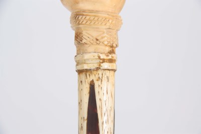 Lot 460 - A 19th CENTURY SCRIMSHAW WHALE BONE WALKING...