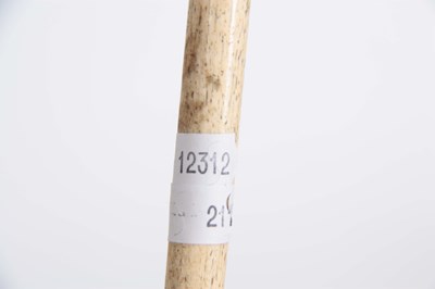 Lot 460 - A 19th CENTURY SCRIMSHAW WHALE BONE WALKING...