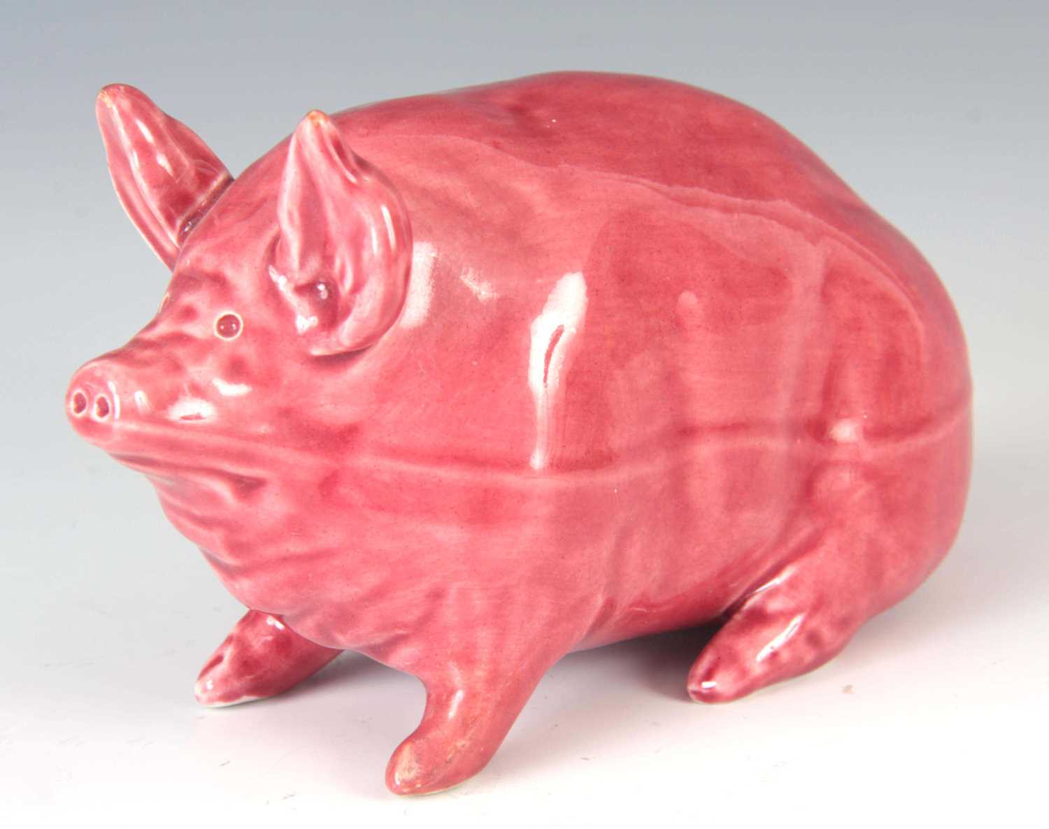 Lot 54 - A WEMYSS WARE PIG CIRCA 1900 having a pink...