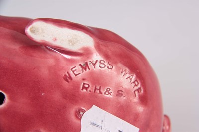 Lot 54 - A WEMYSS WARE PIG CIRCA 1900 having a pink...