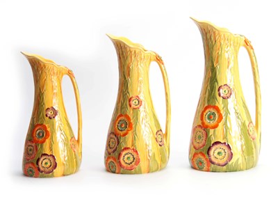 Lot 58 - A SET OF THREE CARLTON WARE TAPERING JUGS with...