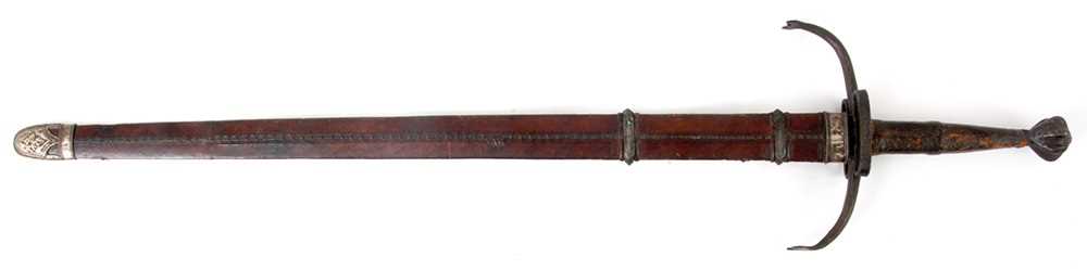 Lot 809 - A LARGE EASTERN SWORD with leather handle,...