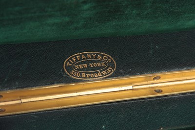 Lot 890 - AN EARLY 20th CENTURY LEATHER BOUND JEWELRY...