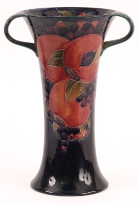Lot 66 - A WILLIAM MOORCROFT POMEGRANATE TWO HANDLED...