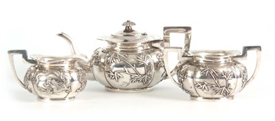 Lot 112 - A 19TH CENTURY CHINESE THREE-PIECE SILVER TEA...