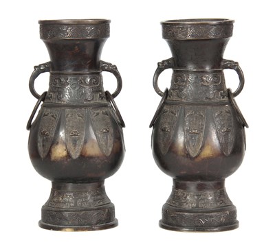 Lot 140 - A PAIR OF CHINESE MING ARCHAIC BRONZE VASES...