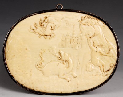 Lot 366 - An 18th/19th Century carved Ivory oval PLAQUE...