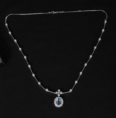 Lot 194 - AN 18CT WHITE GOLD SAPPHIRE AND DIAMOND...