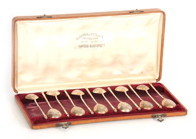 Lot 213 - A RUSSIAN OAK FITTED CASED SET OF TWELVE...