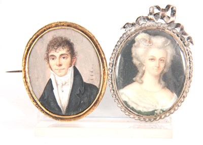 Lot 311 - A 19TH CENTURY MINIATURE OVAL PORTRAIT OF A...