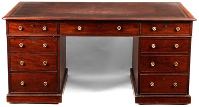 Lot 898 - A LATE GEORGIAN MAHOGANY PARTNERS DESK with...