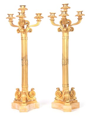 Lot 386 - A PAIR OF FRENCH ORMOLU CANDLELARBRA with four...