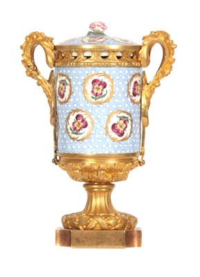 Lot 39 - AN 18th CENTURY SEVRES PORCELAIN ORMOLU...