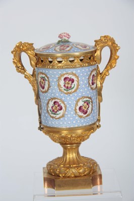 Lot 39 - AN 18th CENTURY SEVRES PORCELAIN ORMOLU...