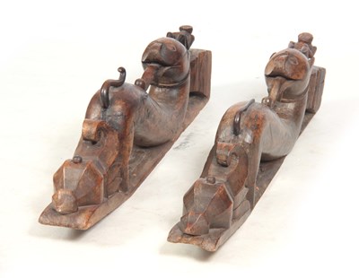 Lot 444 - AN UNUSUAL PAIR OF 19TH CENTURY CARVED AFRICAN...