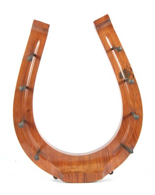 Lot 621 - A LATE 19TH CENTURY WALNUT HORSESHOE SHAPED...