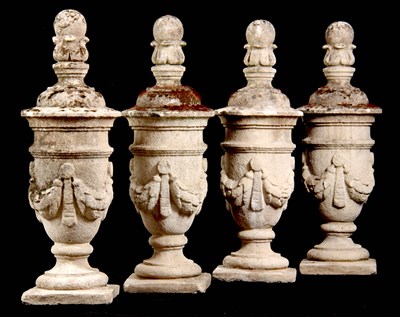 Lot 653 - A SET OF FOUR REGENCY RE-CONSTITUTED STONE...