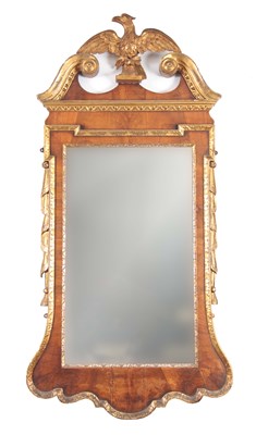 Lot 666 - A GEORGE II WALNUT AND GILT GESSO HANGING...