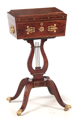 Lot 674 - A REGENCY BRASS INLAID ROSEWOOD TEAPOY the...