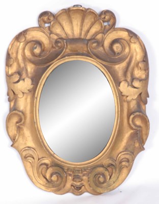 Lot 696 - A LATE 18th CENTURY GILTWOOD OVAL MIRROR, the...