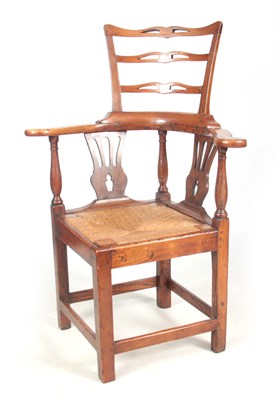 Lot 708 - AN 18TH CENTURY ELM CORNER CHAIR with raised...