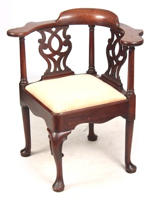 Lot 712 - A GEORGE II MAHOGANY CORNER CHAIR with shaped...