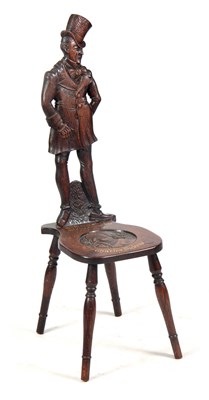 Lot 737 - A CARVED OAK FIGURAL CHAIR OF CHARLES DICKENS...