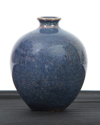 Lot 82 - A SMALL BLUE GLAZED CHINESE BULBOUS VASE with...