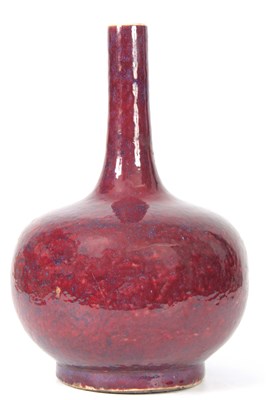 Lot 83 - AN 18th CENTURY FLAMBE GLAZED CHINESE BOTTLE...