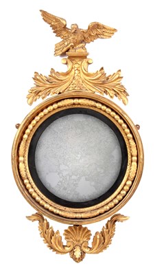 Lot 1003 - A REGENCY GILT GESSO CARVED CIRCULAR CONVEX...