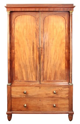 Lot 1056 - AN UNUSUAL FIGURED MAHOGANY LINEN PRESS IN THE...