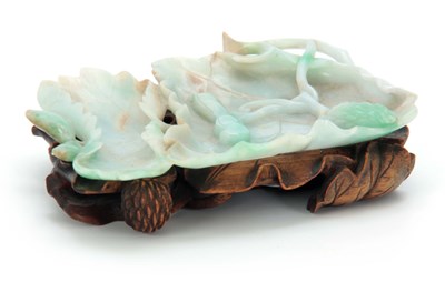 Lot 127 - A 19TH CENTURY CHINESE JADE CARVED SHALLOW...