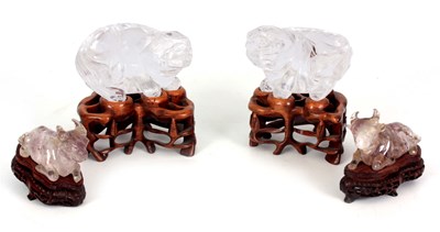 Lot 135 - A PAIR OF CHINESE ROCK CRYSTAL FOO DOGS...